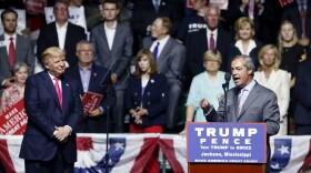 Nigel Farage, ex-leader of the British UKIP party, speaks as Republican presidential candidate Donald Trump, left, listens, at Trump's campaign rally in Jackson, Mississippi, Wednesday, Aug. 24, 2016. (Gerald Herbert/AP)