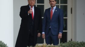 President Donald Trump walks with Interim President of the Bolivarian Republic of Venezuela, Juan Guaidó after Trump acknowledged  Guaidó as the "the true and legitimate president of Venezuela," during the State of the Union. 