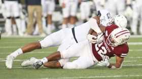 On Oct. 26, 2019, UMass running back Bilal Ally is brought down by to the turf by UConn's Jackson Mitchell. UConn defeated UMass 56-35.