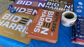 Signs and pamphlets for guests at the Sweets & Swag event.