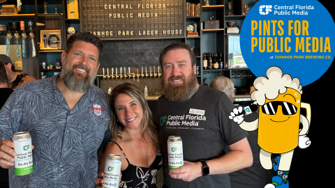 3 people showing off "On-Air Ale" beer cans during the Pints for Public Media event at Ivanhoe Park Brewing Co.