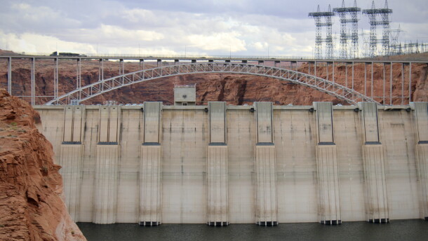 Water levels sit low behind Glen Canyon Dam in Page, Arizona on November 2, 2022. Colorado River experts say long-term changes are needed to keep the region's water use sustainable and avoid catastrophe at major dams and reservoirs.