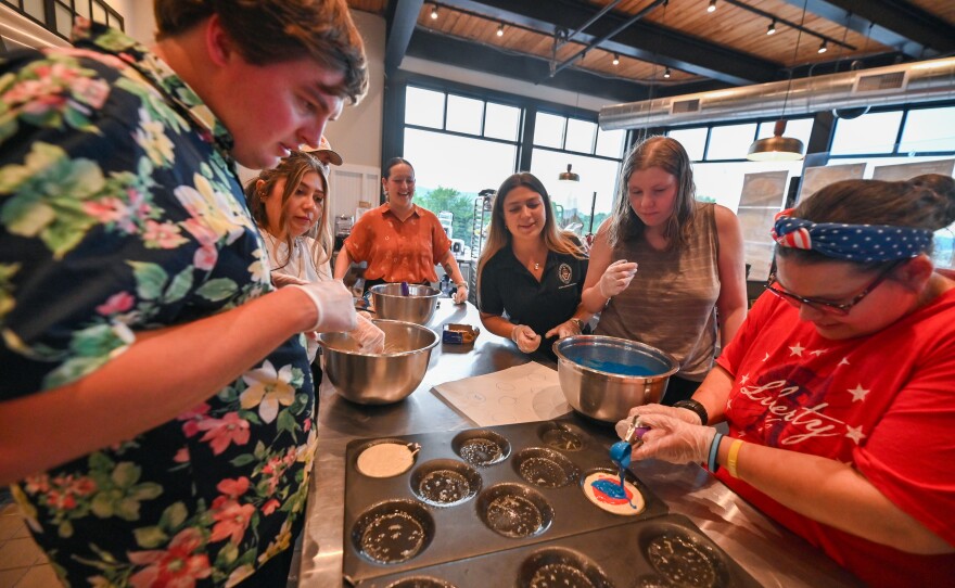 Nick Moulderk, Amanda Hernandez, Brenna Diehl, Emily Squires, Gailey and Heather Hughes prepare to make pancakes.