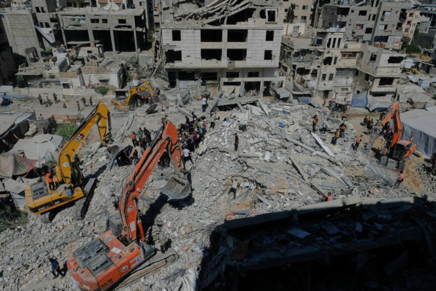 Palestinian civil defense crews search for bodies and survivors in the rubble of a collapsed building that housed displaced Palestinians and was heavily damaged during the Israel-Hamas war, in Gaza City, Wednesday, Sept. 16, 2026. (Jehad Alshrafi/AP)