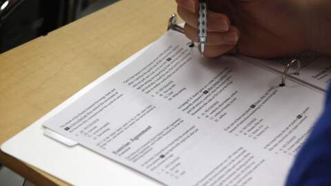 A student looks at questions during a college test preparation class at Holton Arms School in Bethesda, Md.  (Alex Brandon/AP)
