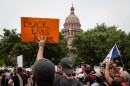 People gathered at the Capitol on Sunday to protest police killings of unarmed black people.