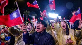 Supporters attend a Kuomintang (KMT) campaign rally ahead of Taiwan's presidential election in Taipei.