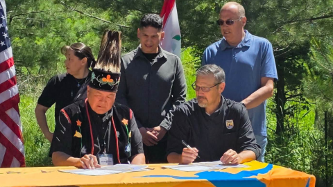 White Earth Nation Chairman Michael Fairbanks and US Fish and Wildlife Service Regional Director Will Meeks sign a multi-year funding agreement June 30, 2026 at Tamarac Wildlife Refuge.