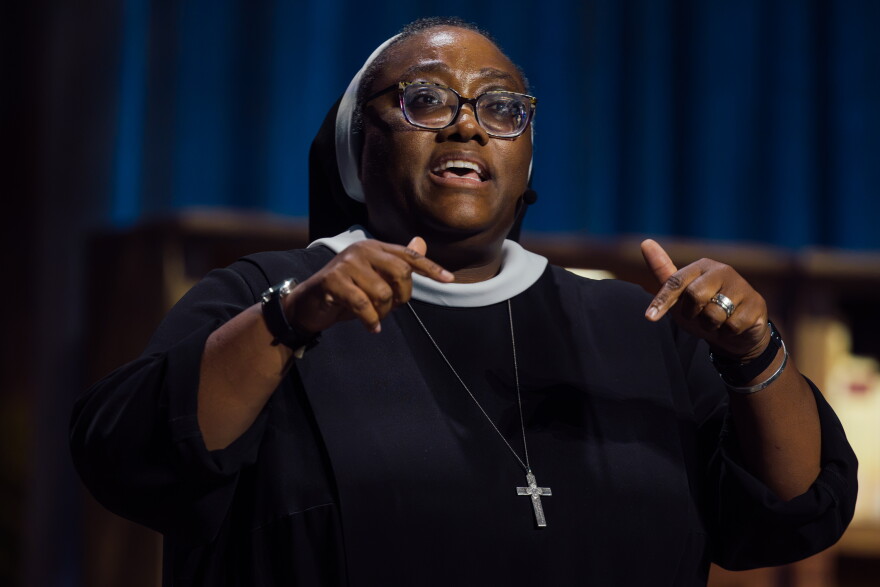 Sister Josephine Garrett speaks ahead of the beatification Mass for the late Archbishop Fulton J. Sheen on Thursday at the Dome.