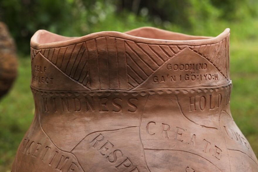 An Iroquois pot created by Native American artist Mike Jones for Ganondagan's Earth Altars project.