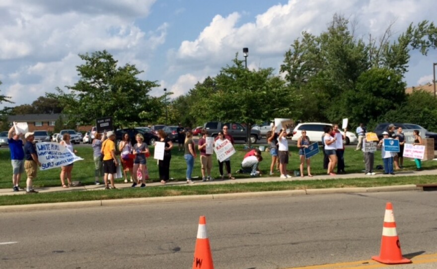 Demonstrators with the anti-racism group SURJ Greater Dayton held a rally in Centerville on Saturday, Aug. 19. The event was organized in solidarity with the victims of the Aug. 12 attack at a white nationalist "Unite the Right" rally in Charlottesville,