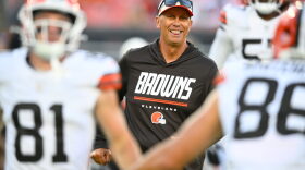 Cleveland Browns head coach Todd Monken watches warmups before a preseason NFL football game against the New England Patriots Thursday, Aug. 27, 2026, in Cleveland.  