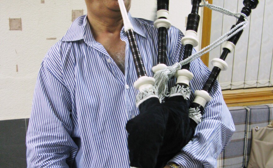 Naeem Akhbar is chief executive of Halifax and Co., a more than 70-year-old bagpipe manufacturer in Sialkot. Here, he plays the most expensive bagpipe his company produces, which sells for $700 in Pakistan and more than $1,600 in Europe and the U.S.