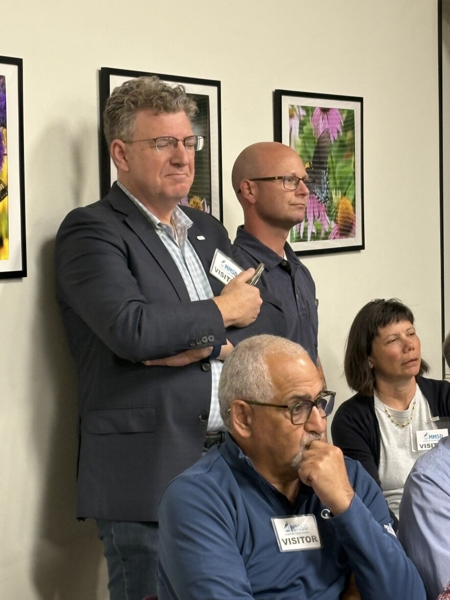 Local Veolia executive Paul Keppler (standing right) says he stands by his company's commitment to Milwaukee and its wastewater treatment plant employees.