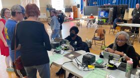 Voters file into the polling place at Granby Elementary in Norfolk on Nov. 5, 2024.