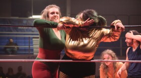 Chokecherry shoves the Golden Heartbreaker into the ropes while Mary Lou “Thunder Thighs” Fagan and Rocky look on during a FLOW show on Feb. 21, 2026.