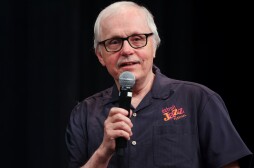 Marion Hayden receives the Ron Brooks Award from SEMJA President Lars Bjorn