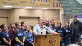J.W. Smith Elementary Principal Bruce Goodwin addresses the Bemidji School Board, surrounded by J.W. staff, during a public hearing at Bemidji High School on March 24, 2026.