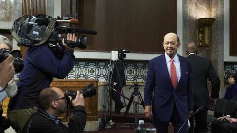 Billionaire investor Wilbur Ross, Commerce Secretary nominee for U.S. President-elect Donald Trump, arrives Wednesday for his Senate confirmation hearing. Ross is warning America's trading partners to practice "fair trade" and cut state control over business if they want access to the world's biggest economy.