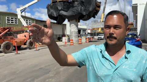 Tyler Dos Santos-Tam points out streets in the Iwilei neighborhood on Monday, Oct. 5, 2026 where the Skyline rail line is being built in Honolulu.