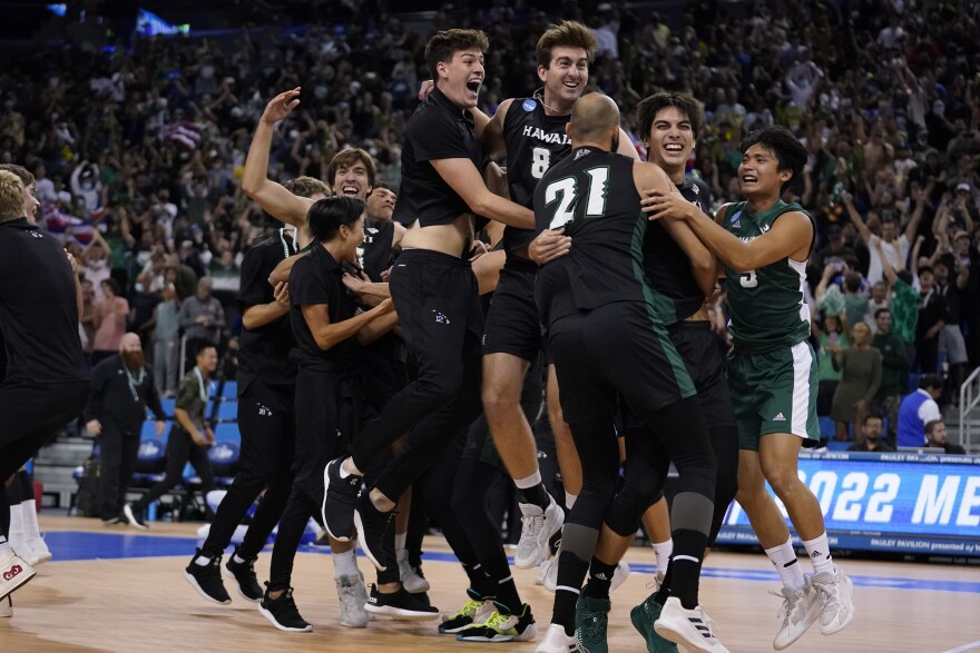 Hawaiʻi players celebrate after defeating Long Beach State to win the NCAA men's college volleyball championship Saturday, May 7, 2022, in Los Angeles. (AP Photo/Marcio Jose Sanchez)