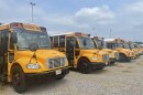 School buses parked outside Hopewell High School, on July 26, 2021