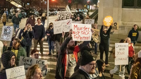 Anti-Ice protestors march to the E. Ross Adair Federal Building Thursday evening to protest recent shootings by ICE agents in other cities.