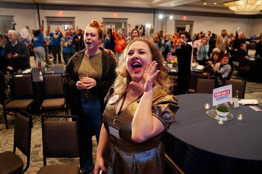 Abortion Action Missouri volunteers Megan O’Brien, right, cheers as national abortion rights voting measure results are announced during a watch party on Tuesday at the Marriott St. Louis Grand in downtown St. Louis. Amendment 3 is sponsored by the Missourians for Constitutional Freedom and would enshrine the right to an abortion in the state constitution.