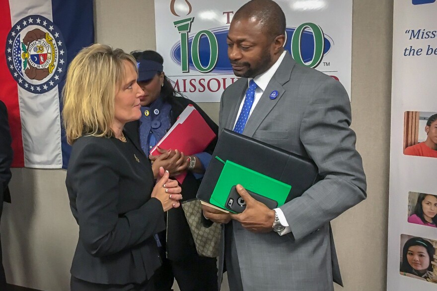 Then-Education Commissioner Margie Vandeven, left, speaks to St. Louis Public Schools Superintendent Kelvin Adams in January 2017. Vandeven was fired last December but will return as education commissioner.