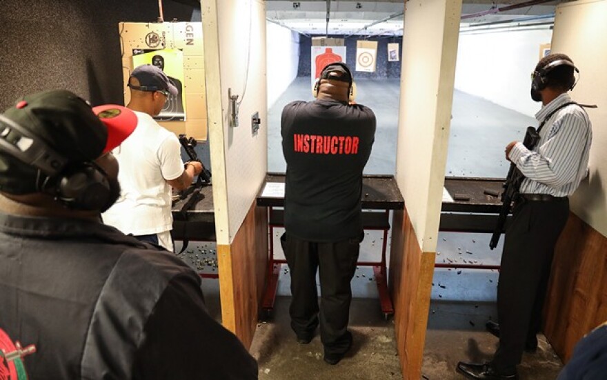 Members of the Rochester African American Firearms Association shoot targets at The Firing Pin.