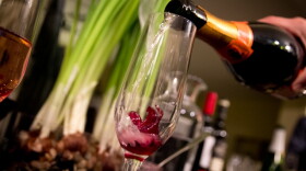 Champagne being poured in a glass