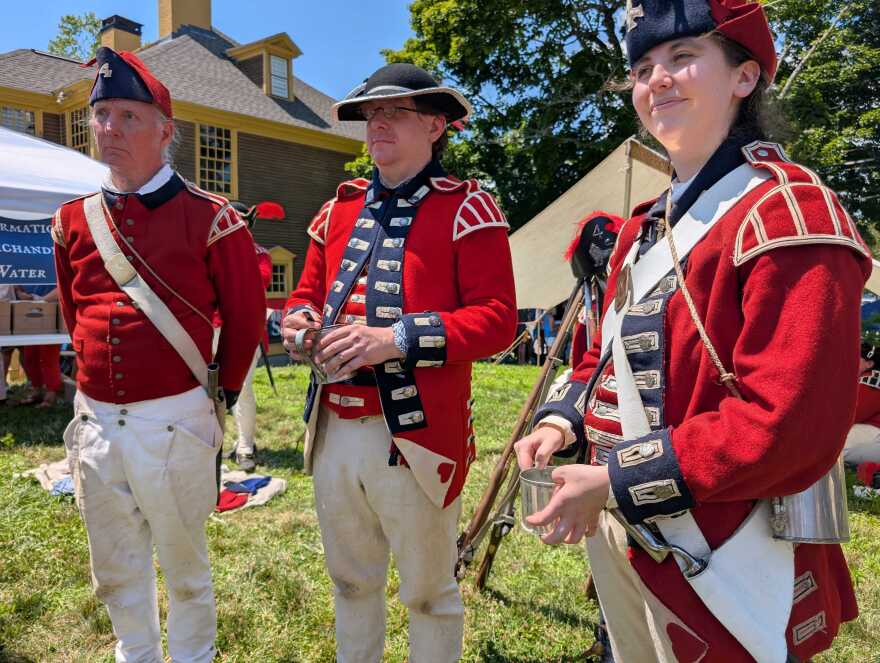 Revolutionary reenactors portray members of the Royal Army