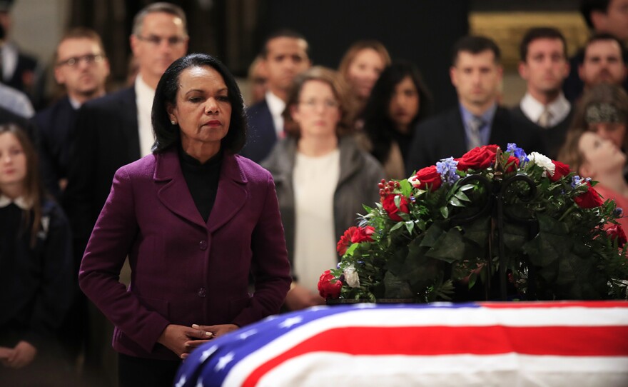 Former Secretary of State Condoleezza Rice pays her last respect to former President George H.W. Bush as he lies in state at the U.S. Capitol in Washington, Tuesday, Dec. 4, 2018. 