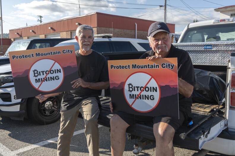 Johnson County residents Scott Allen (left) and Dan Conner (right) as seen on Thursday, Aug. 7, 2025. The two showed up at a town hall meeting called by the Mountain City Board of Mayor and Aldermen on Thursday to voice their opposition to a bitcoin mine planned for a 50 acre parcel in the middle of a residential part of town.
