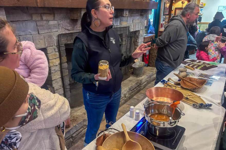 Leah Hopkins talks about maple sugaring for those gathered at the community event on Saturday, March 21, 2026.
