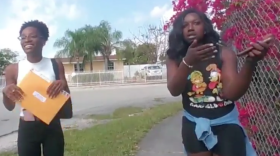 Dyma Loving, right, with her friend before a Miami-Dade polic officer tackled her to the ground after calling for help. 