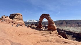 Delicate Arch in Arches National Park outside of Moab. The town uses lodging taxes to offset tourism impacts.