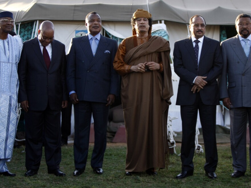 Libyan leader Moammar Gadhafi (third from right) stood with five delegates of the African Union after negotiations Sunday at his Bab al-Aziziya compound in Tripoli. From left: Presidents Amadou Toumani Toure of Mali, Jacob Zuma of South Africa, Denis Sassou Nguesso of Congo and Mohamed Ould Abdel Aziz of Mauritania, and African Union Commission Chairman Jean Ping.
