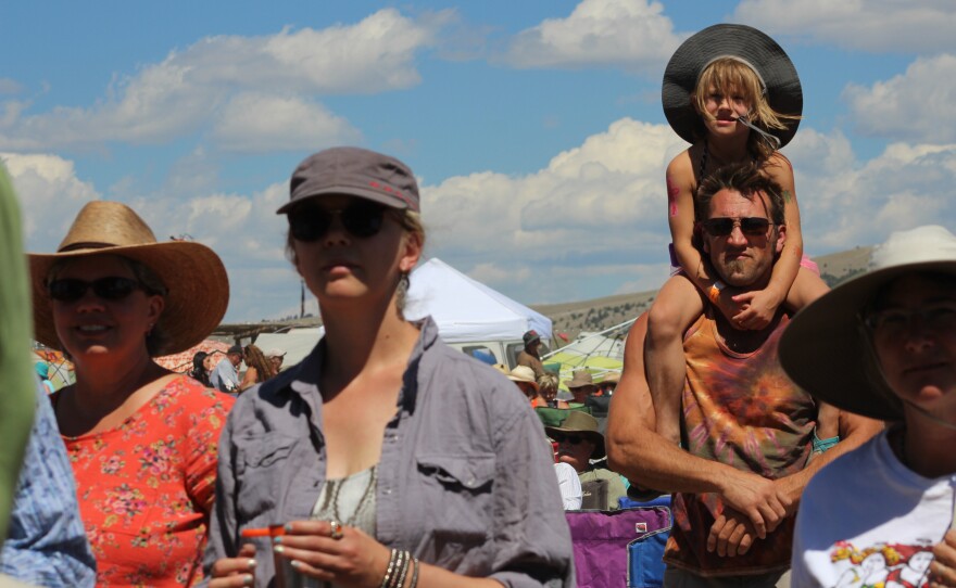 A daughter and her father watch Laney Jones perform on Saturday