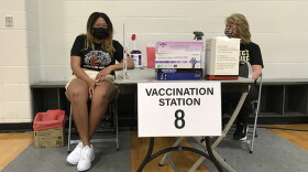 A Purdue student is vaccinated on the first day of the university's clinic.