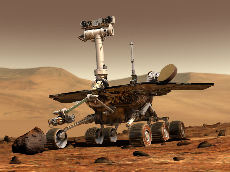 An artist's depiction of NASA's Spirit rover on the surface of Mars. Spirit became unresponsive in March 2010. NASA announced it had ended attempts to communicate with the rover on May 24, 2011.