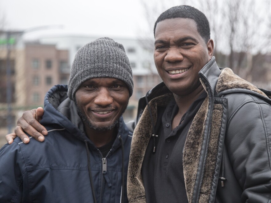 Cedric Burnside (left) poses with his cousin, Kent Burnside (right) before his Dec. 1, 2018 performance in Des Moines, Iowa.