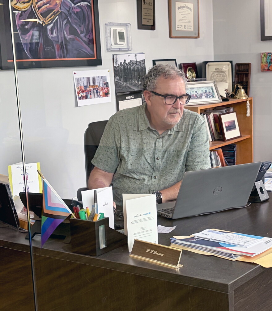 Ben Lessing, CEO of Community Care Alliance, works in his office in Woonsocket, Aug. 28, 2026. Credit: Ocean State Media/Paul Singer
