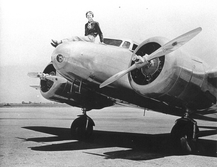 Amelia Earhart sits on her Lockheed Model 10-E Electra in March 1937.