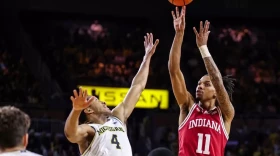 Indiana's C.J. Gunn shoots against Michigan during Tuesday night's game in Ann Arbor, Mich.