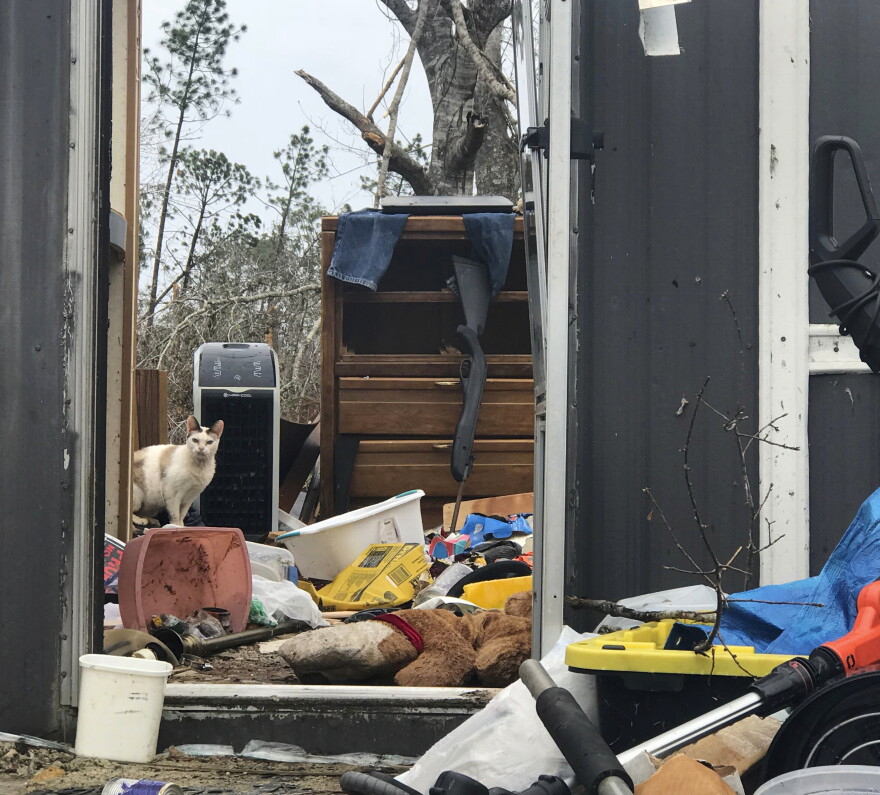  Mark Ward surveys the destruction of his neighbor's mobile home in Bay County, Fla. Ward and his neighbors say that the rural parts of the county have seen little help since Hurricane Michael. (10/23/18)