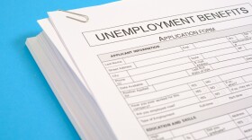 Photo illustration of unemployment application forms