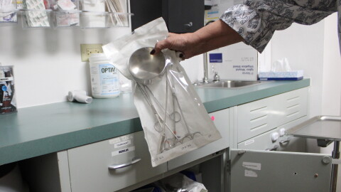 Jackie Marshall, site manager at the Mountain Family Health Center in Glenwood Springs, holds an IUD kit with tenaculums. Mountain Family is a local partner of FreeBC, a privately funded program that started providing free birth control to Coloradans in May.