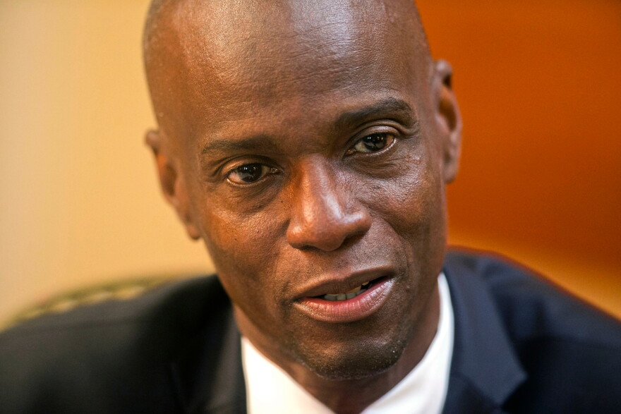 FILE - Haiti's President Jovenel Moise speaks during an interview at his home in Petion-Ville, a suburb of Port-au-Prince, Haiti, on Feb. 7, 2020. (AP Photo/Dieu Nalio Chery, File)