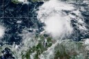 This NOAA satellite image taken at 11:40 a.m. EST on Tuesday, Oct. 21, 2025, shows Tropical Storm Melissa in the Central Caribbean Sea.